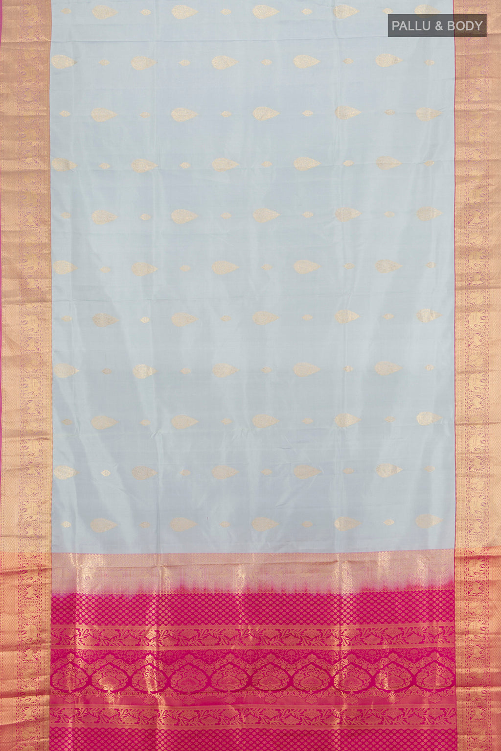 Flat view of Grey Soft Silk Saree with Zari Butta on the body and Zari Border. 