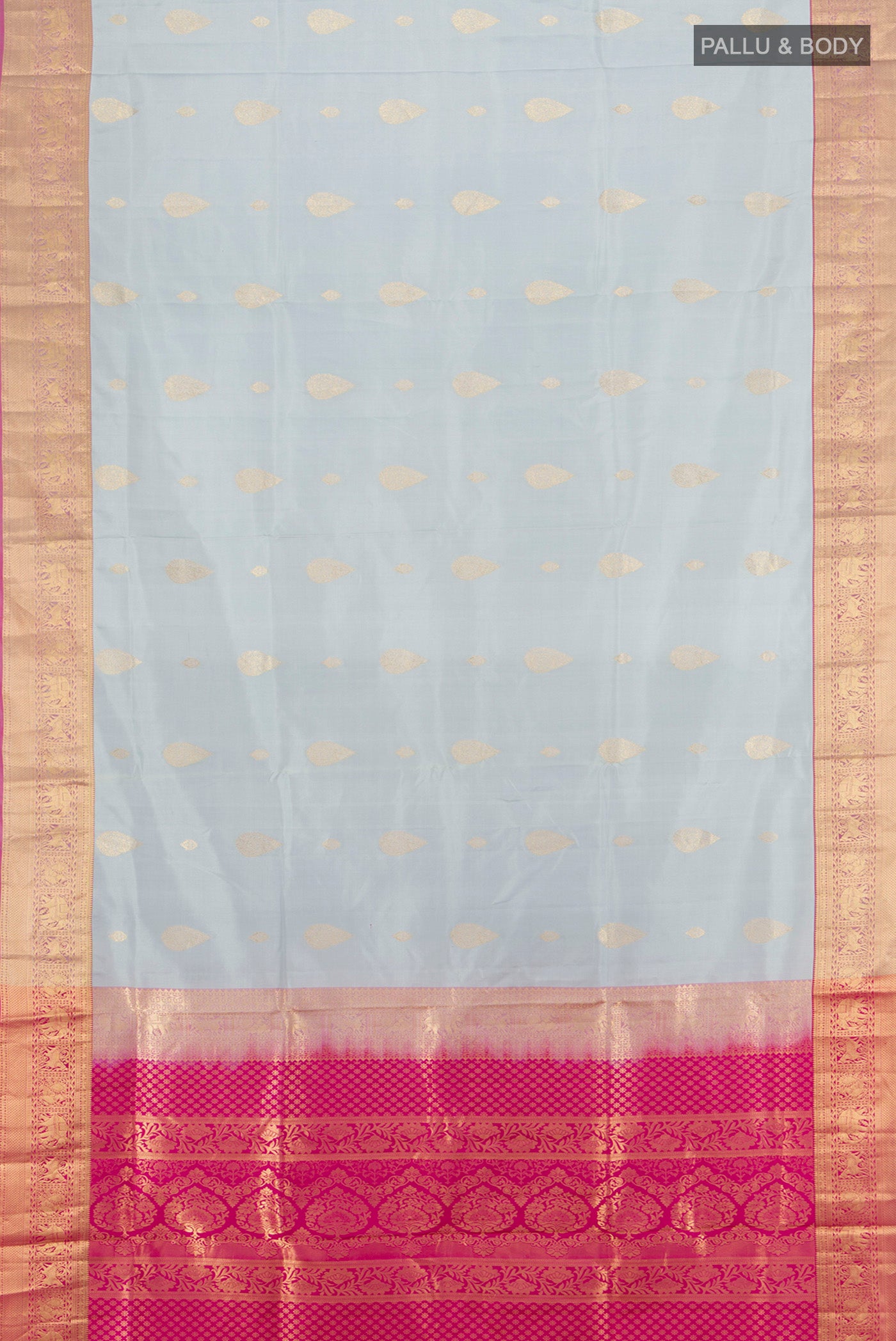 Flat view of Grey Soft Silk Saree with Zari Butta on the body and Zari Border. 
