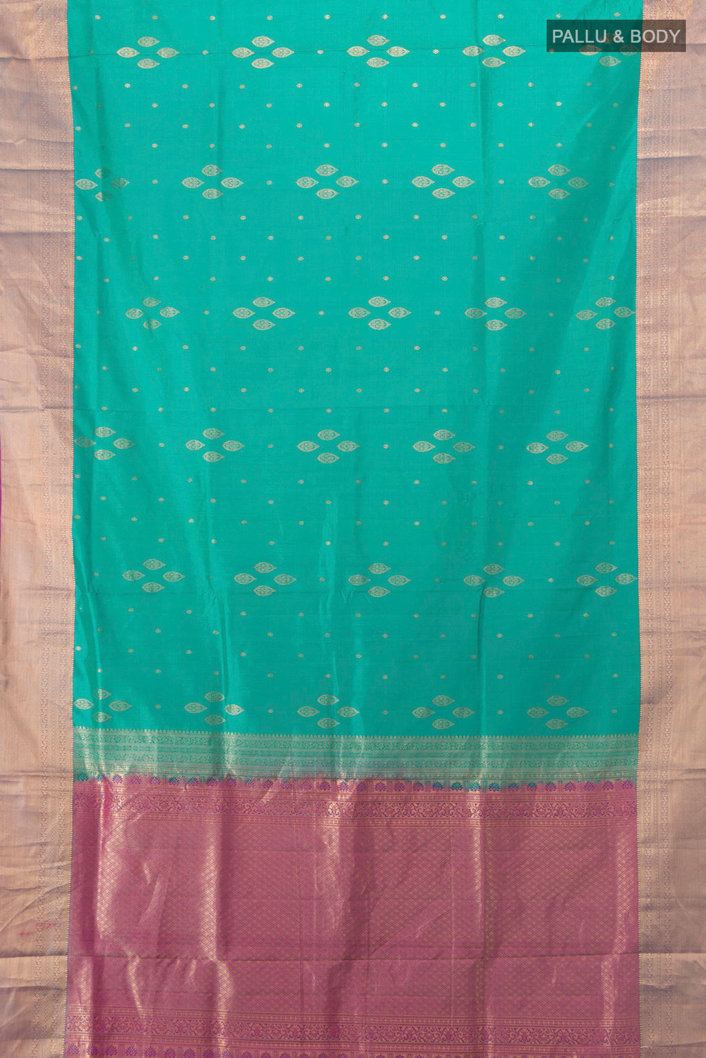 Flat view of Light Blue Soft Silk Saree with Zari Butta on the body and Silk Border. 