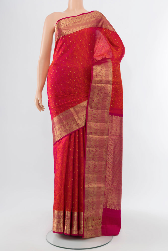 Dark Pink Soft Silk Saree with Zari Butta on the body and Silk Border.  displayed on a mannequin