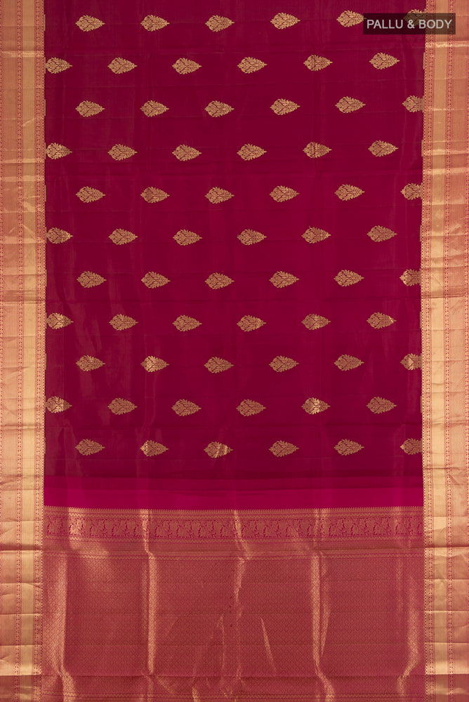 Flat view of Maroon Soft Silk Saree with Zari Brocade on the body and Silk Border. 