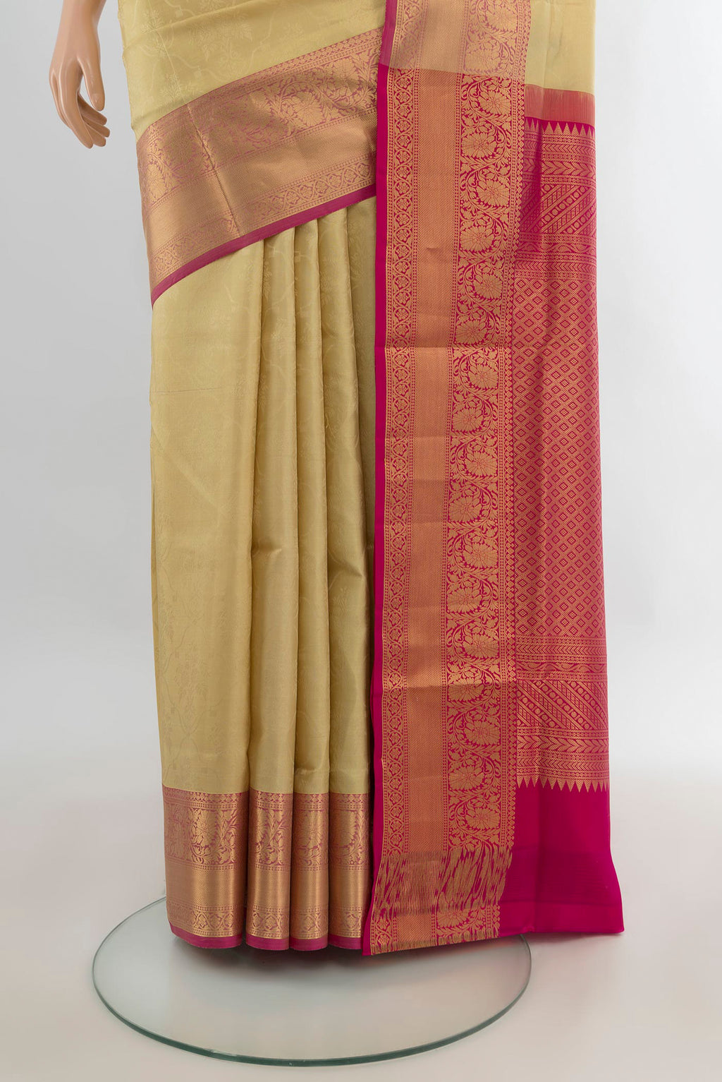 Pleats and pallu of Pure Silk Sandal Soft Saree with Jacquard design on the body and Zari Border. 