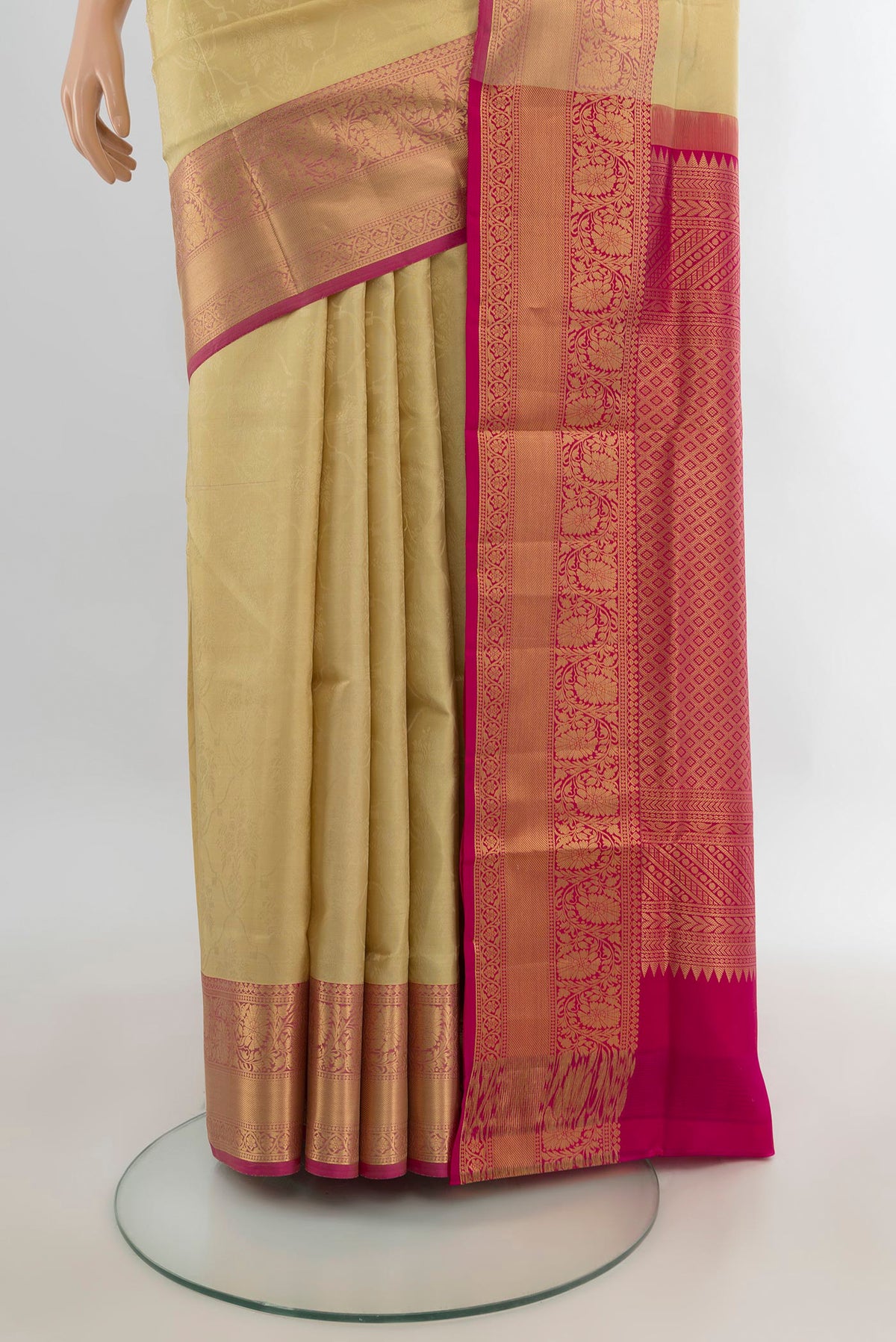 Pleats and pallu of Pure Silk Sandal Soft Saree with Jacquard design on the body and Zari Border. 