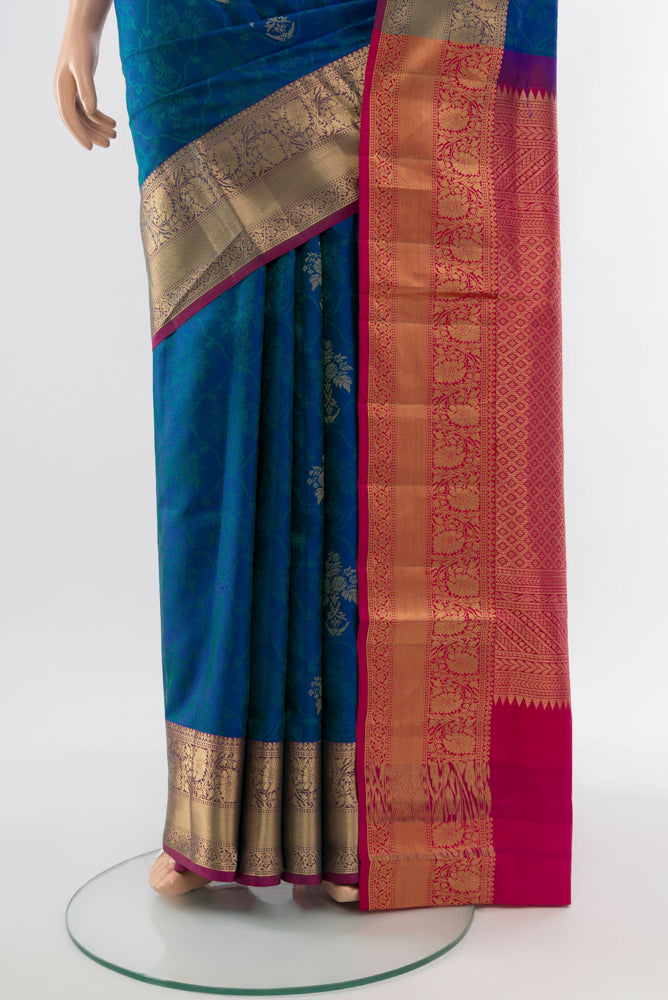 Pleats and pallu of Dark Blue Soft Silk Saree with Zari Butta on the body and Silk Border. 