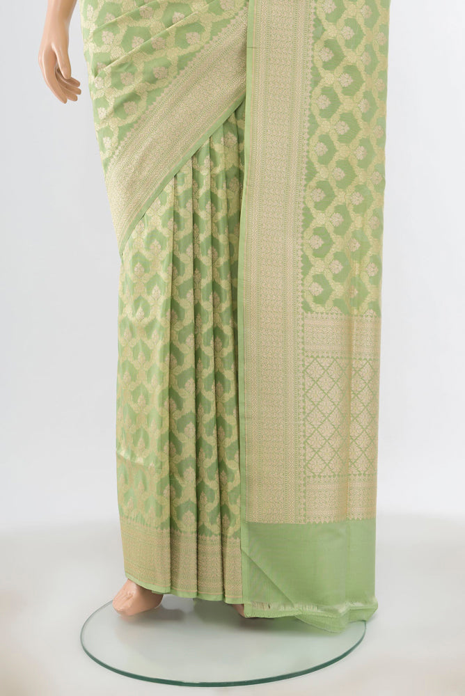 Pleats and pallu of Pista Green Banarasi Silk Saree with Zari Butta on the body and Silk Border. 