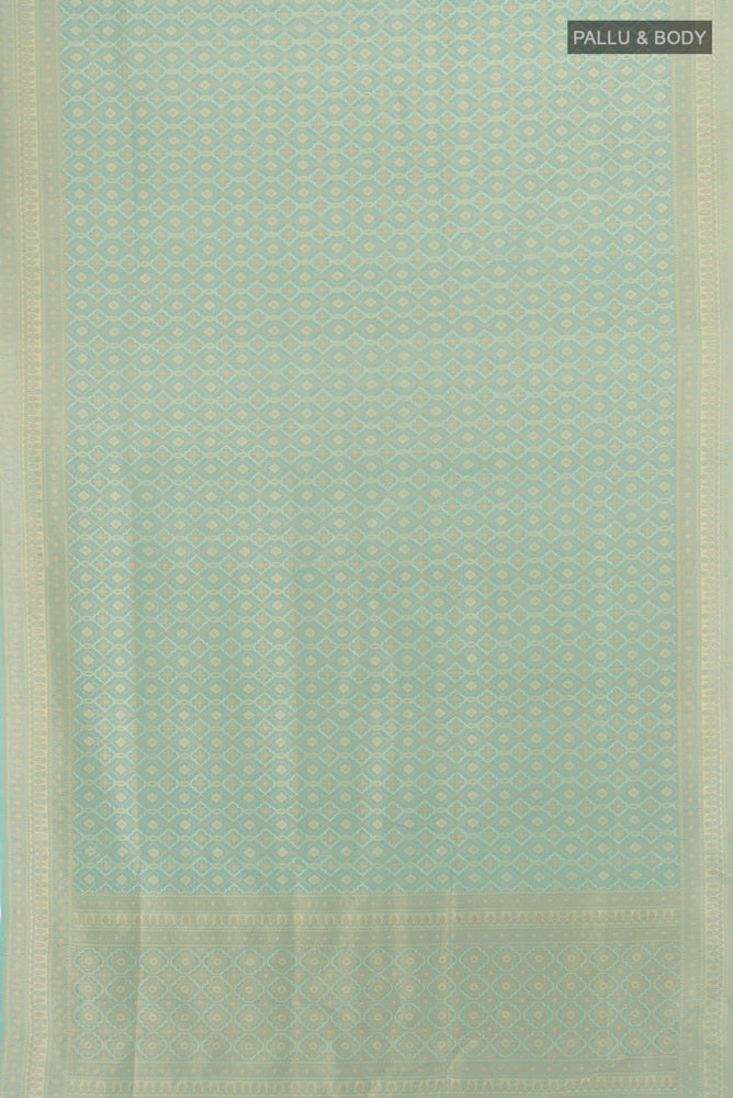 Flat view of Sky Blue Banarasi Silk Saree with Zari Butta on the body and Silk Border. 