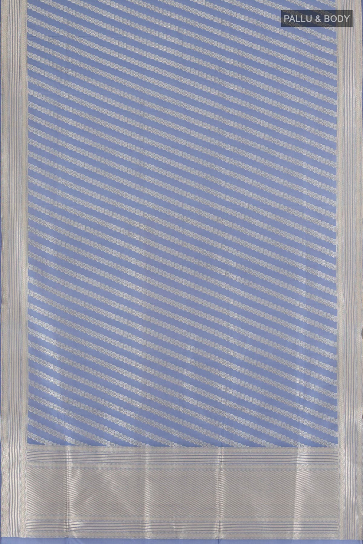 Flat view of Pure Silk Light Blue Banarasi Saree with Zari Butta on the body and Zari Border. 
