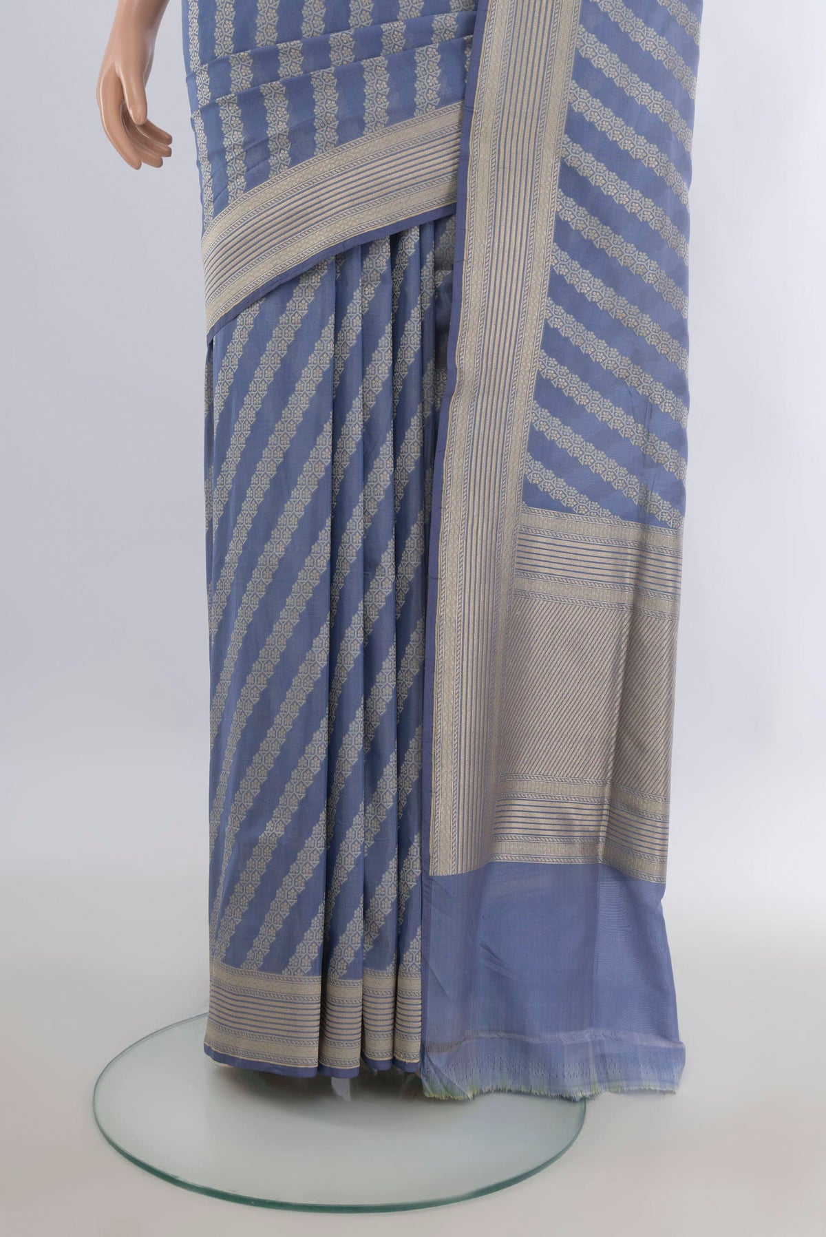 Pleats and pallu of Pure Silk Light Blue Banarasi Saree with Zari Butta on the body and Zari Border. 