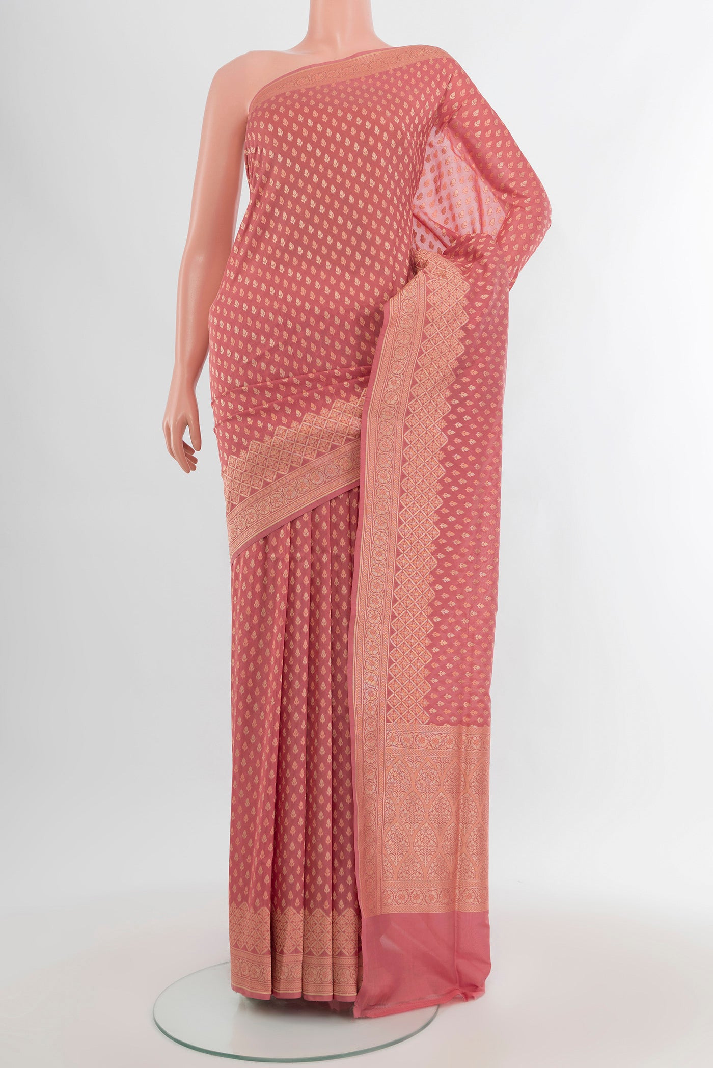 Rose pink Banarasi Silk Saree with Zari Butta on the body and Zari Border.  displayed on a mannequin
