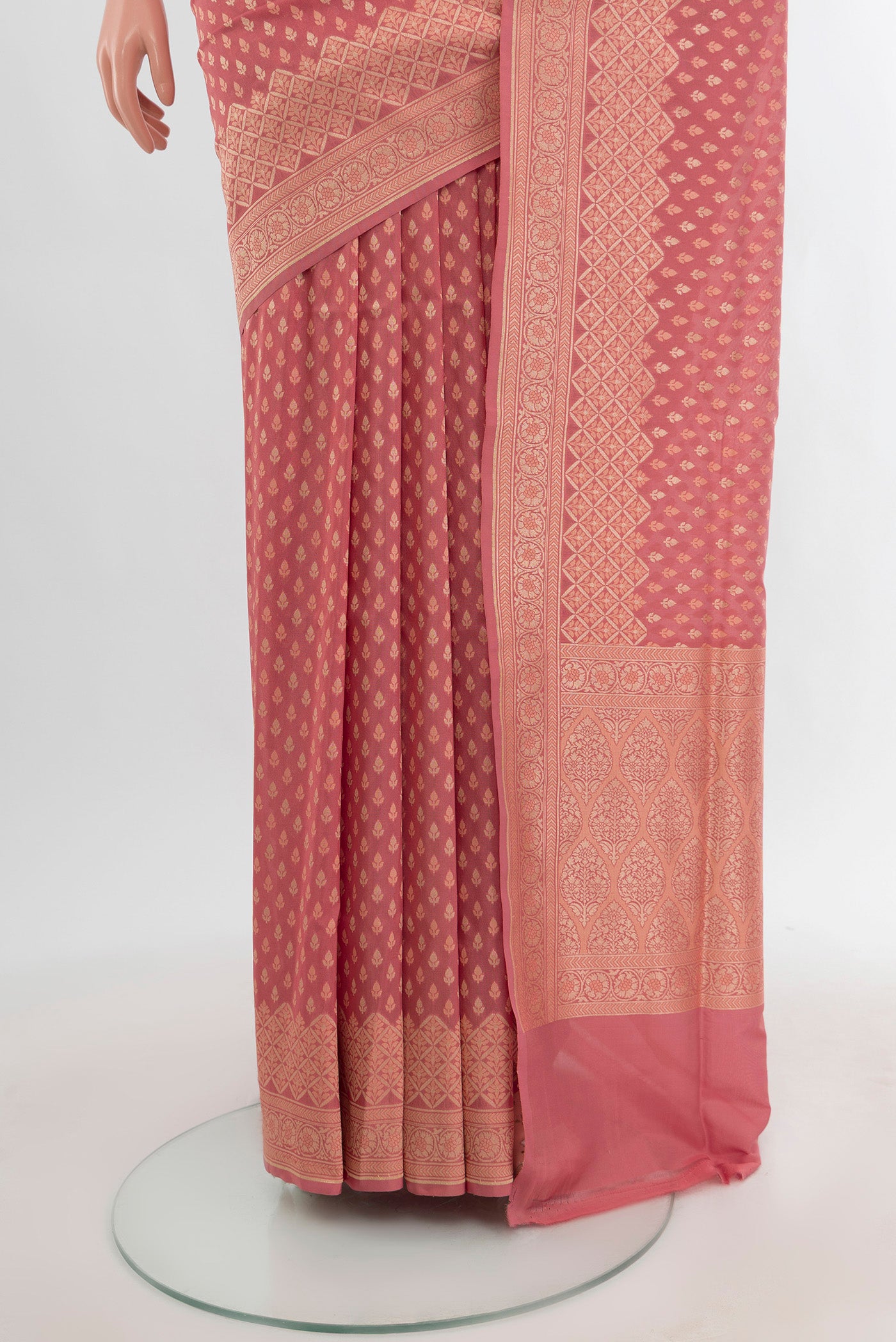 Pleats and pallu of Rose pink Banarasi Silk Saree with Zari Butta on the body and Zari Border. 