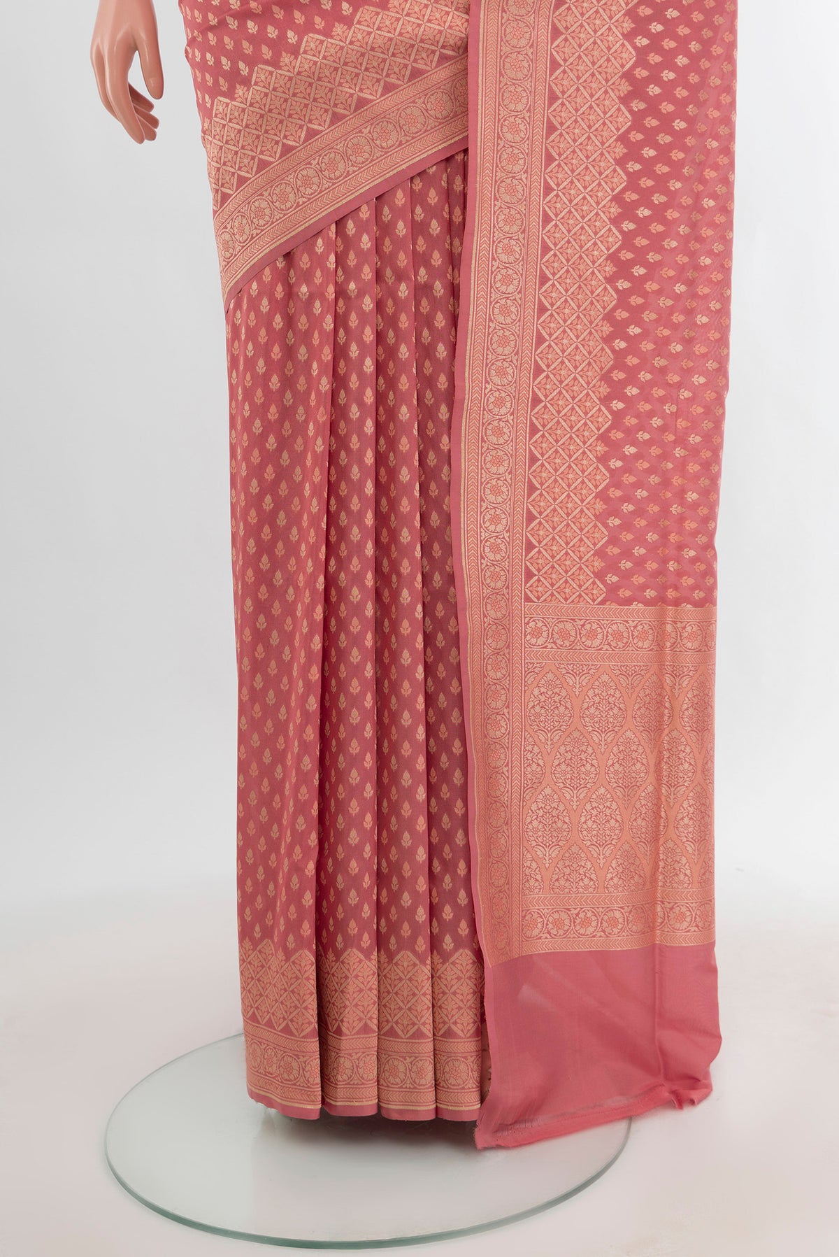 Pleats and pallu of Rose pink Banarasi Silk Saree with Zari Butta on the body and Zari Border. 