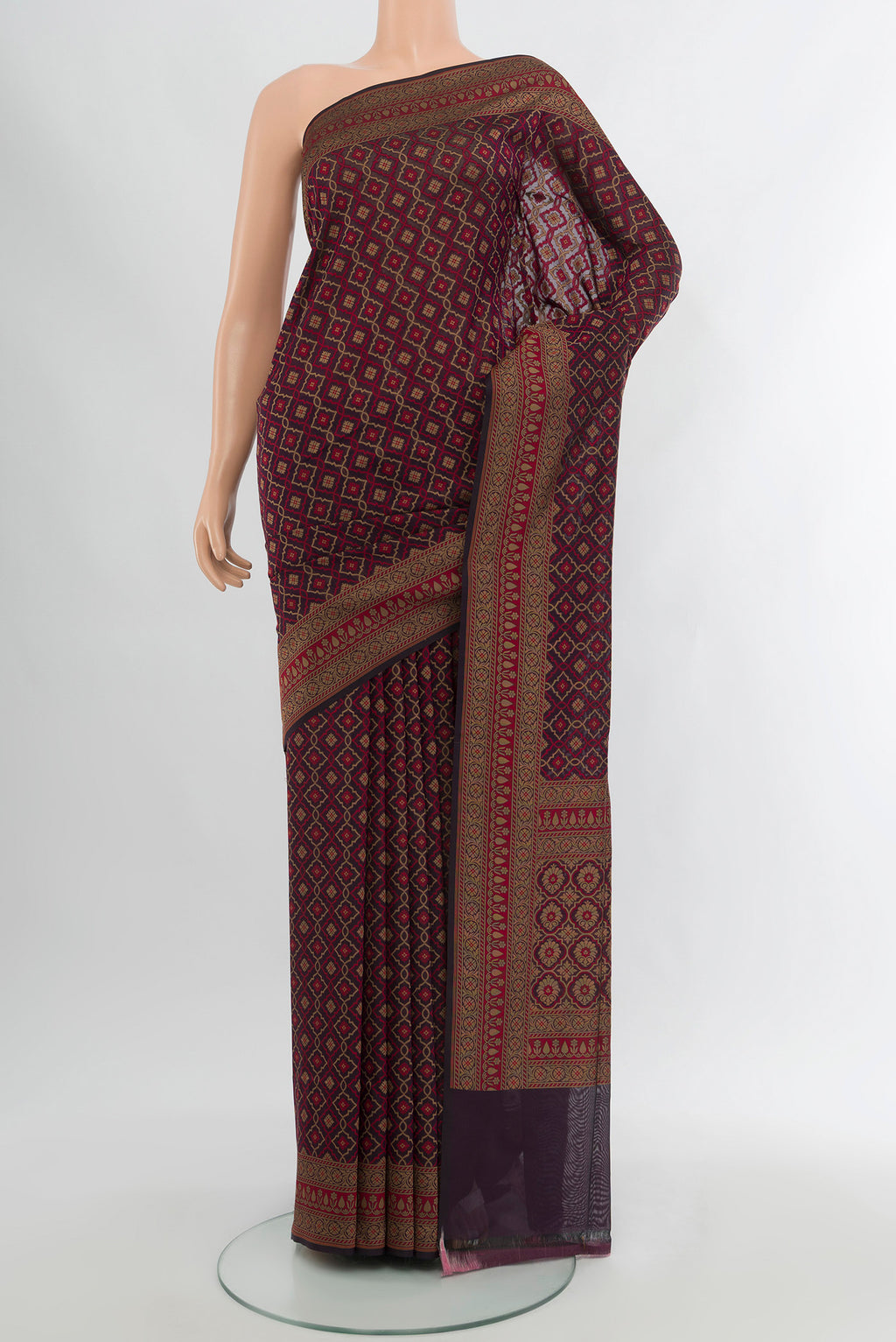 Brown Banarasi Silk Saree with Zari And Thread Butta on the body and Zari Border.  displayed on a mannequin