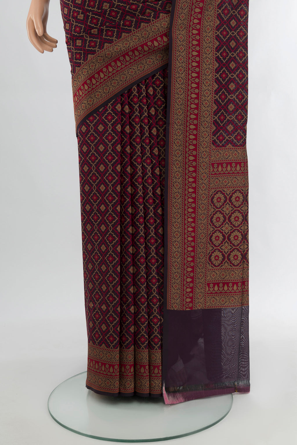Pleats and pallu of Brown Banarasi Silk Saree with Zari And Thread Butta on the body and Zari Border. 