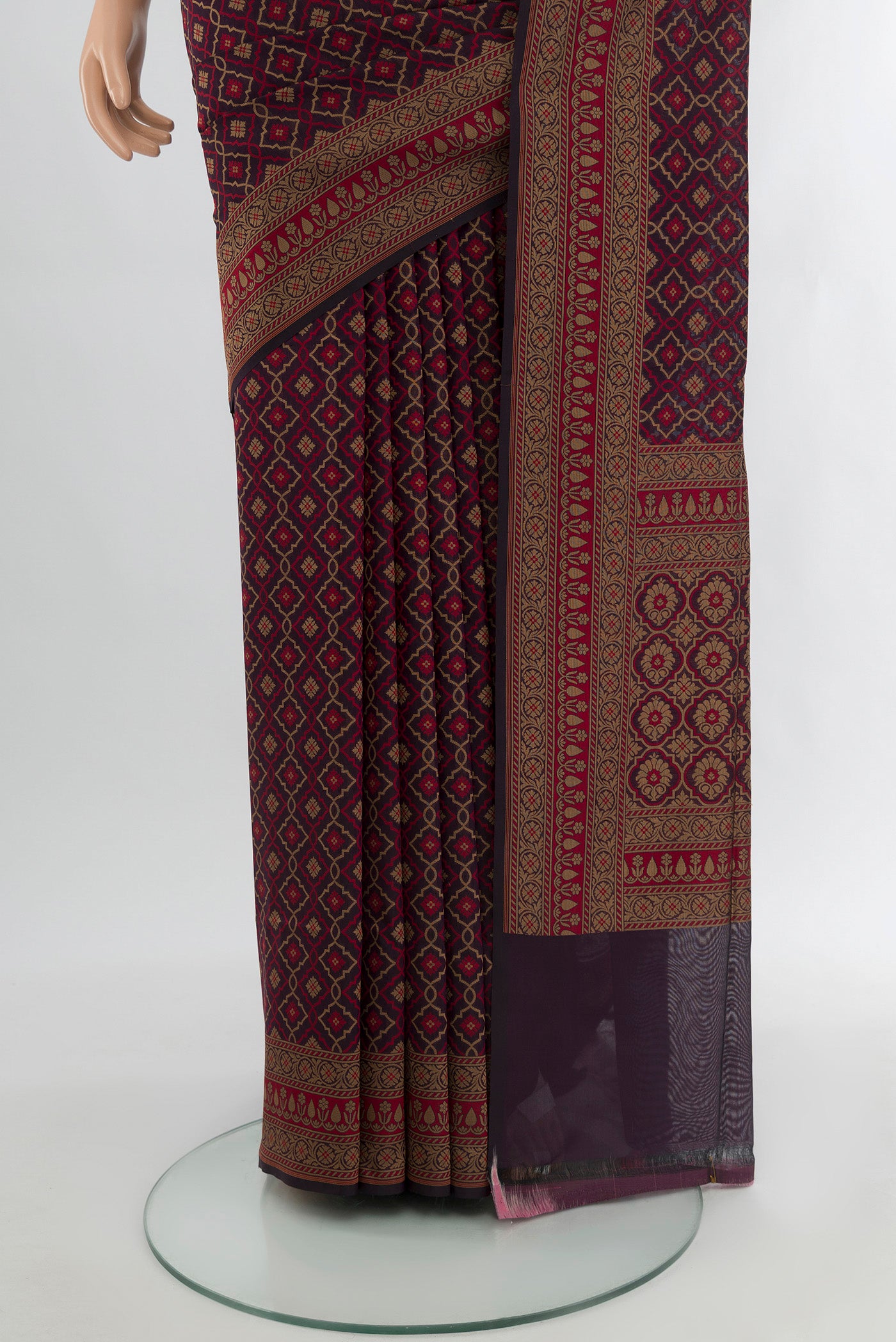 Pleats and pallu of Brown Banarasi Silk Saree with Zari And Thread Butta on the body and Zari Border. 