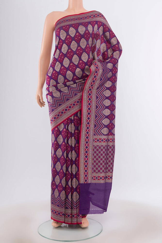 Multi Color Banarasi Silk Saree with Zari Butta on the body and Silk Border.  displayed on a mannequin
