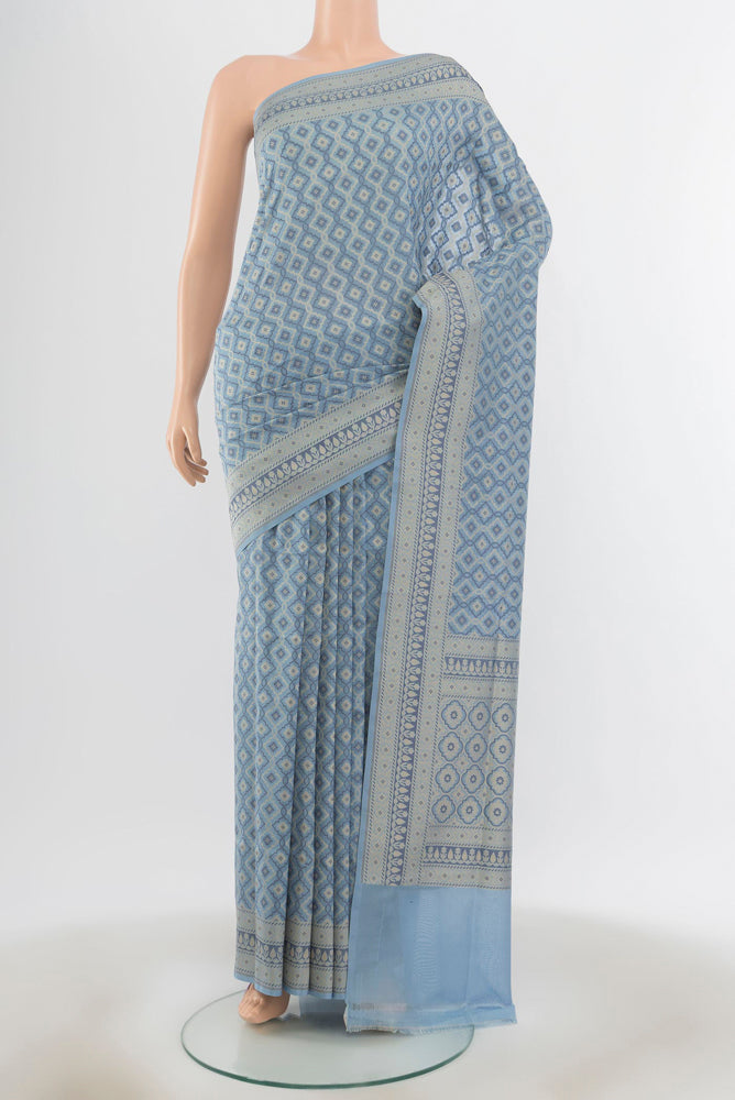 Lavender Banarasi Kora Silk Saree with Plain Body and Silk Border.  displayed on a mannequin