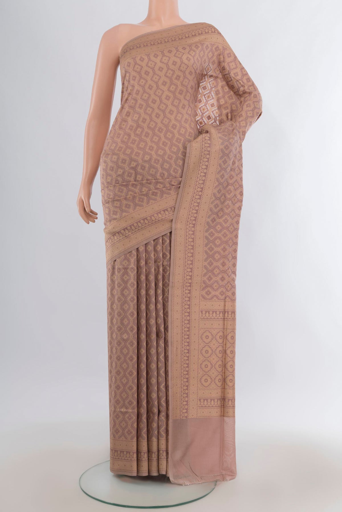 Pure Silk Brown Banarasi Saree with Thread Butta on the body and Zari Border.  displayed on a mannequin