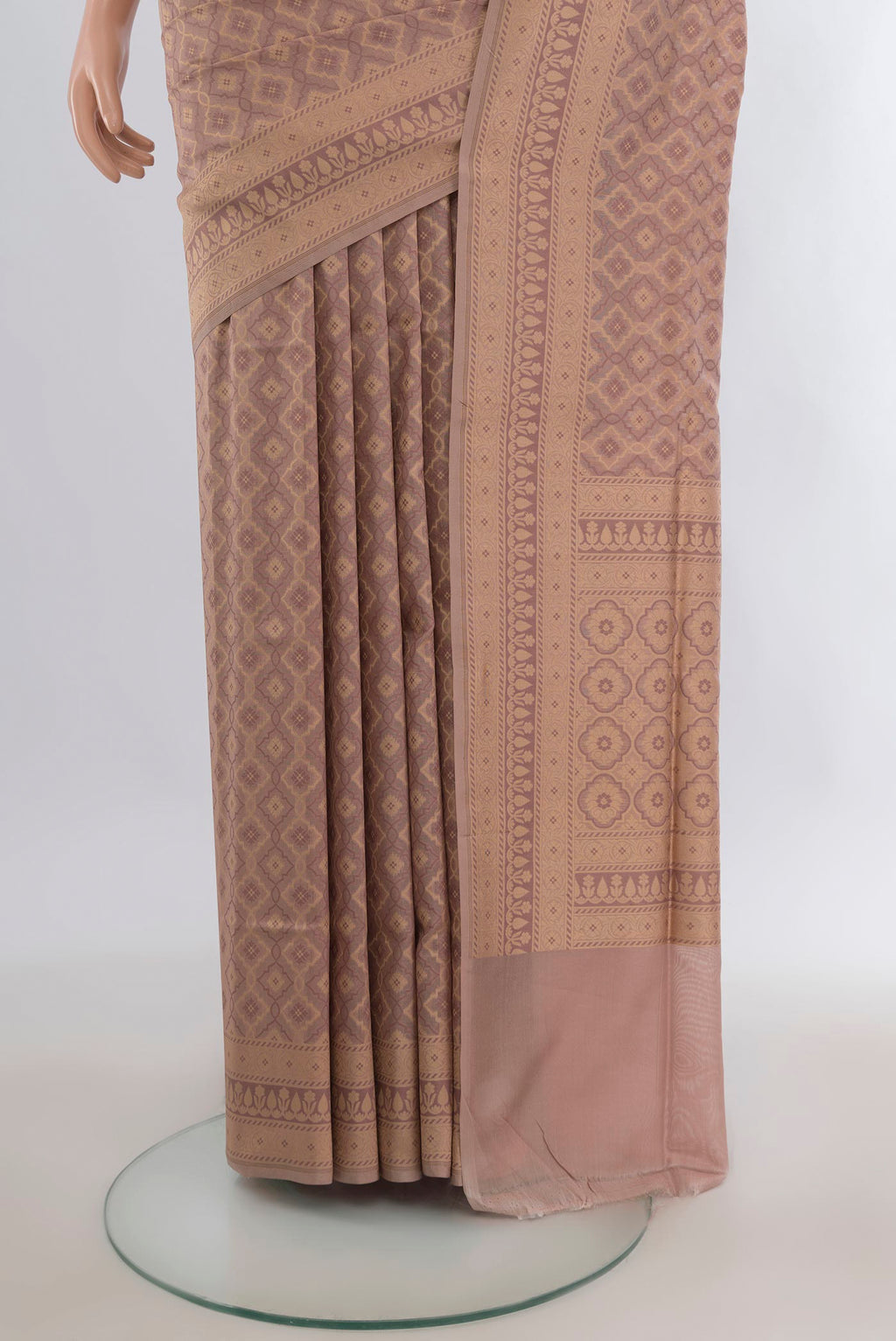 Pleats and pallu of Pure Silk Brown Banarasi Saree with Thread Butta on the body and Zari Border. 