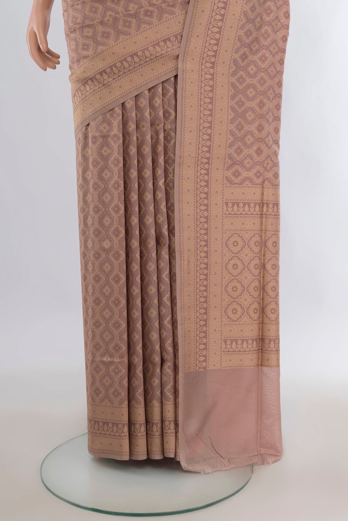 Pleats and pallu of Pure Silk Brown Banarasi Saree with Thread Butta on the body and Zari Border. 