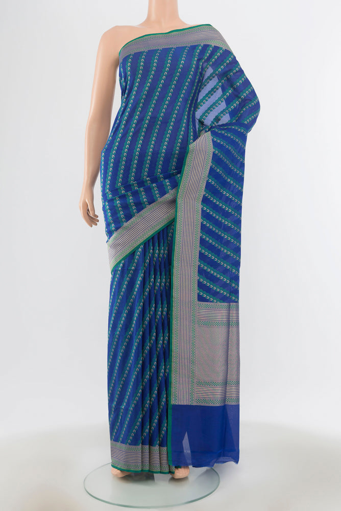 Multi Color Banarasi Silk Saree with Zari Butta on the body and Silk Border.  displayed on a mannequin