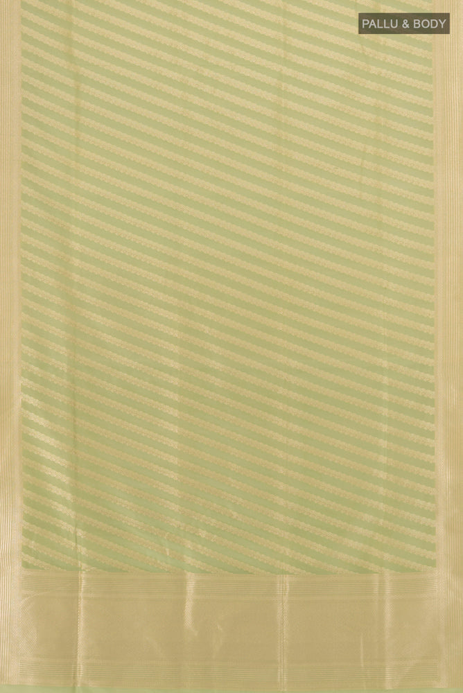 Flat view of Pista Green Banarasi Silk Saree with Zari Butta on the body and Silk Border. 
