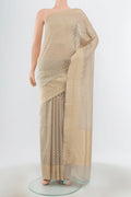 Lilac Banarasi Silk Saree with Zari Butta on the body and Silk Border.  displayed on a mannequin