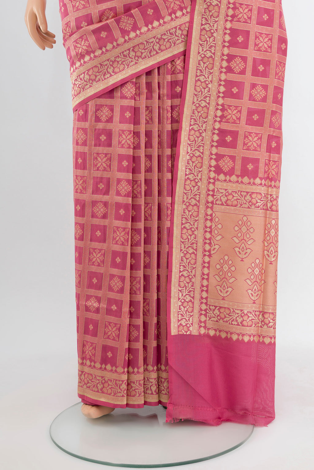 Pleats and pallu of Bronze Banarasi Silk Saree with Zari Butta on the body and Silk Border. 