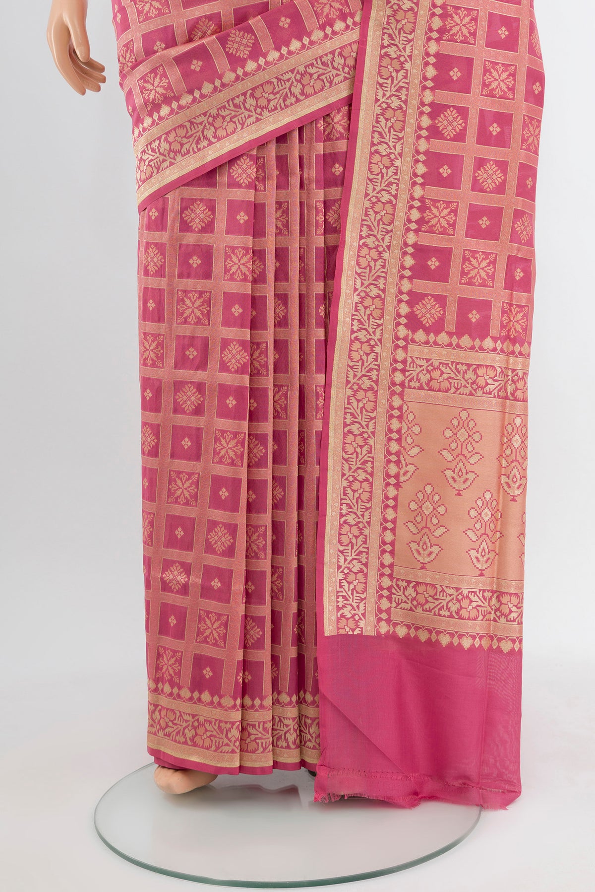 Pleats and pallu of Bronze Banarasi Silk Saree with Zari Butta on the body and Silk Border. 