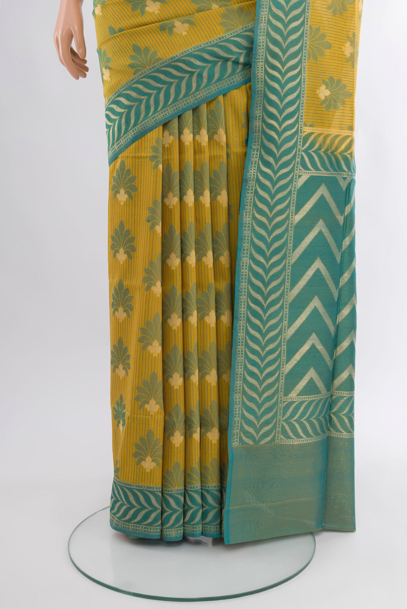 Pleats and pallu of Yellow Banarasi Silk Saree with Zari And Thread Butta on the body and Zari Border. 