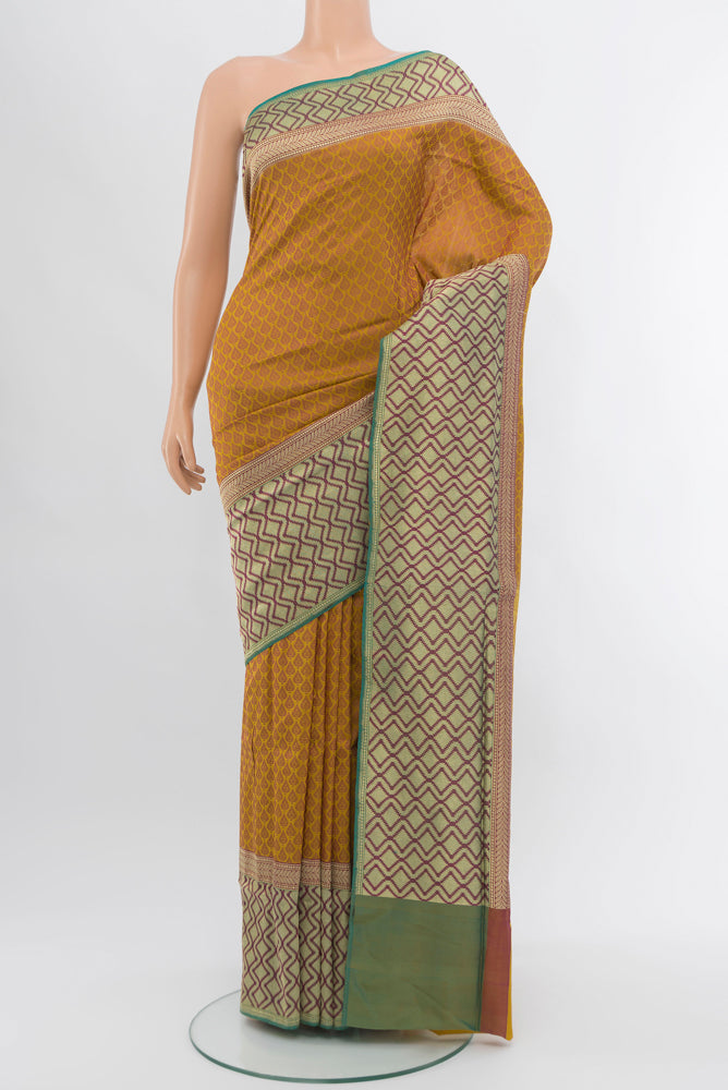 Multi Color Banarasi Silk Saree with Zari Butta on the body and Silk Border.  displayed on a mannequin
