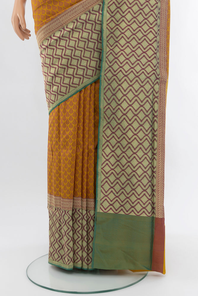 Pleats and pallu of Multi Color Banarasi Silk Saree with Zari Butta on the body and Silk Border. 