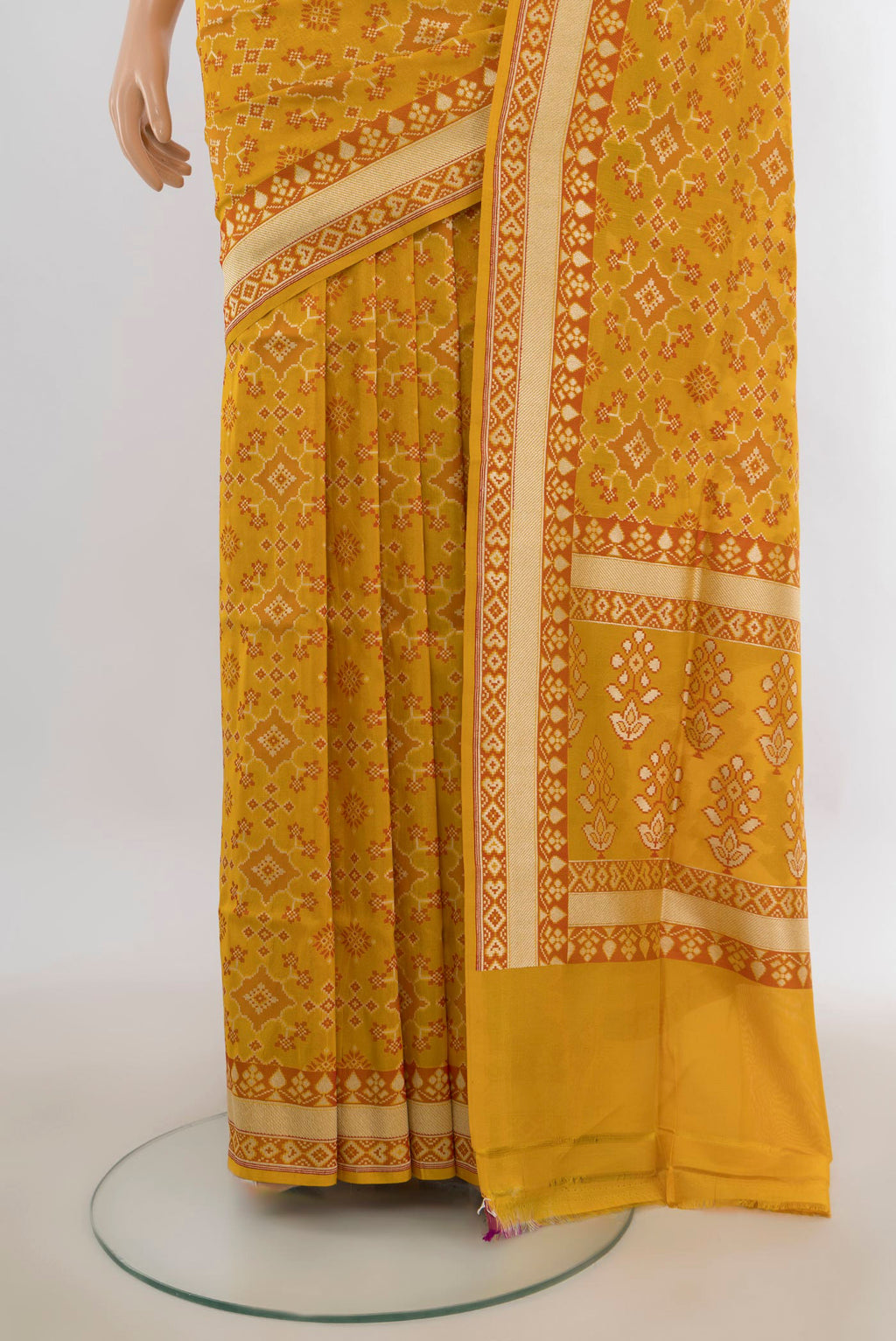 Pleats and pallu of Pure Silk Yellow Banarasi Saree with Zari And Thread Butta on the body and Zari Border. 