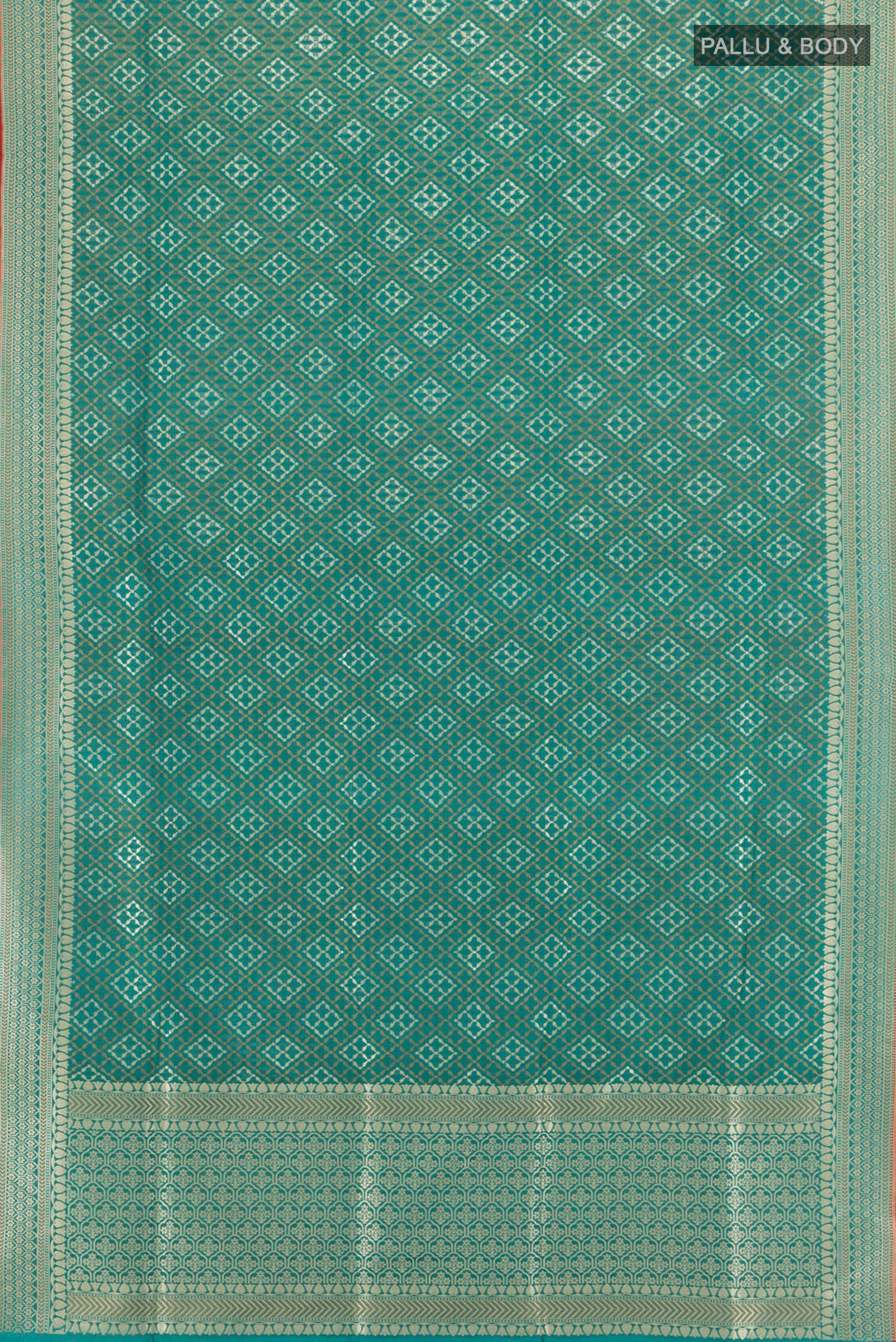 Flat view of Peacock Blue Banarasi Silk Saree with Zari And Thread Butta on the body and Zari Border. 