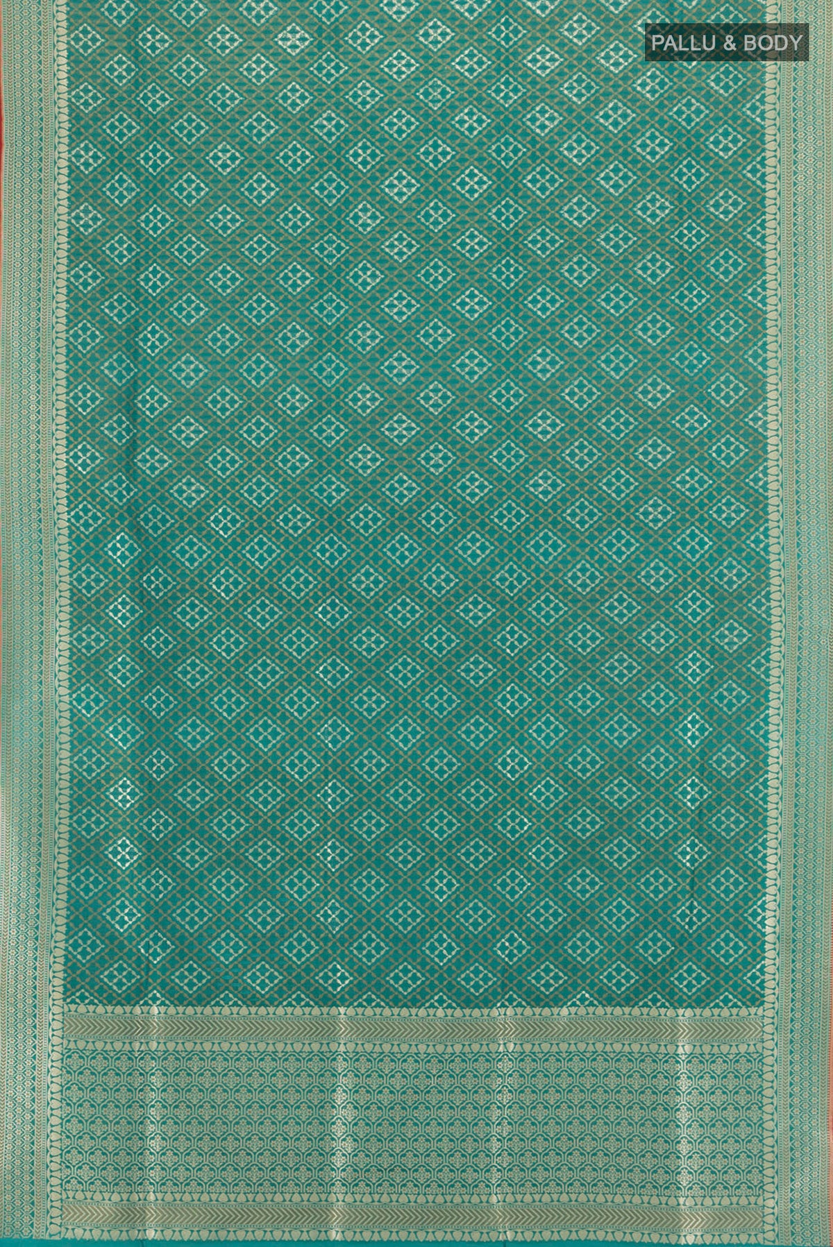 Flat view of Peacock Blue Banarasi Silk Saree with Zari And Thread Butta on the body and Zari Border. 
