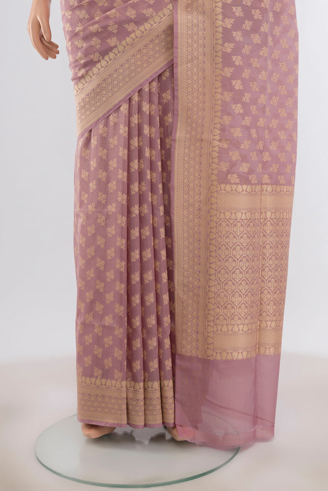 Pleats and pallu of Bronze Banarasi Silk Saree with Zari Butta on the body and Silk Border. 