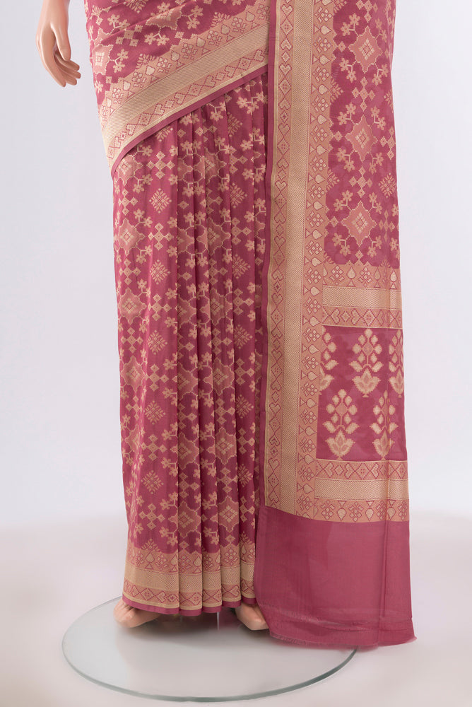 Pleats and pallu of Bronze Banarasi Silk Saree with Zari Butta on the body and Silk Border. 