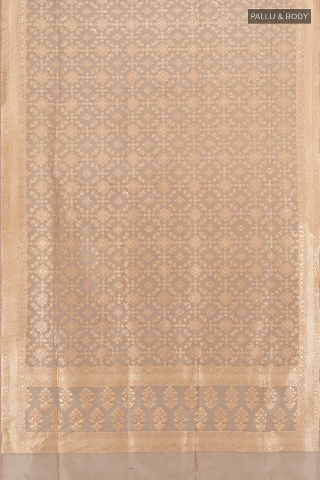 Flat view of Grey Banarasi Silk Saree with Zari Butta on the body and Zari Border. 