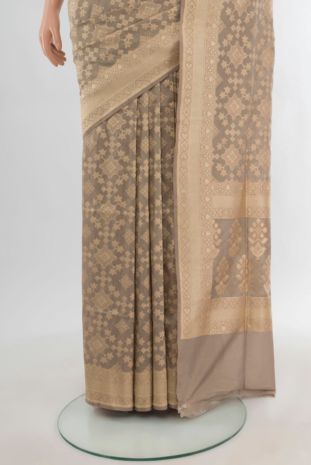 Pleats and pallu of Grey Banarasi Silk Saree with Zari Butta on the body and Zari Border. 