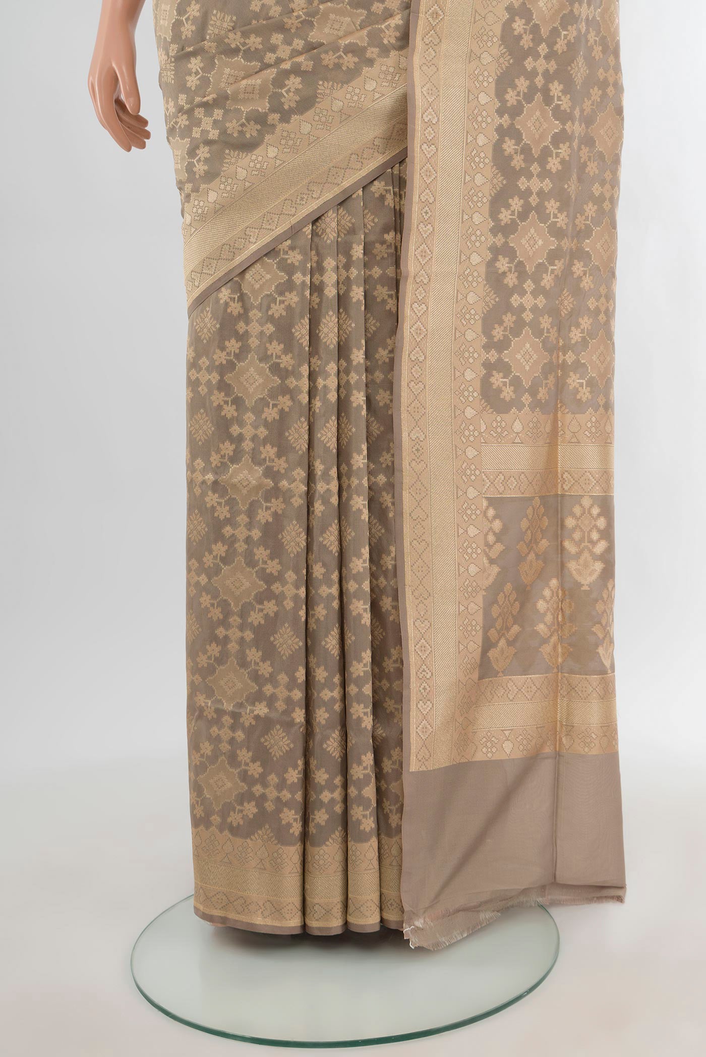 Pleats and pallu of Grey Banarasi Silk Saree with Zari Butta on the body and Zari Border. 