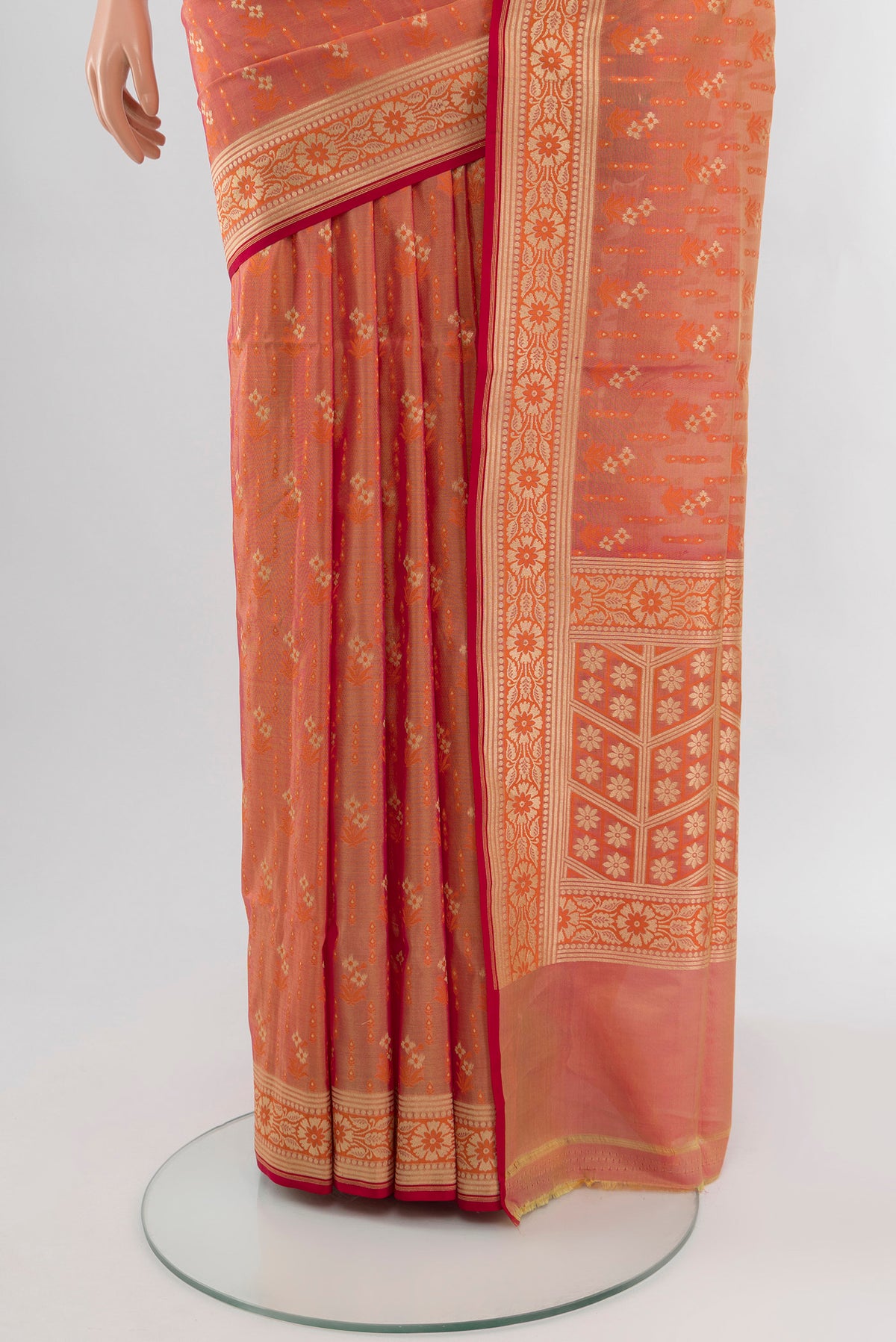 Pleats and pallu of Peach Banarasi Silk Saree with Zari Butta on the body and Zari Border. 