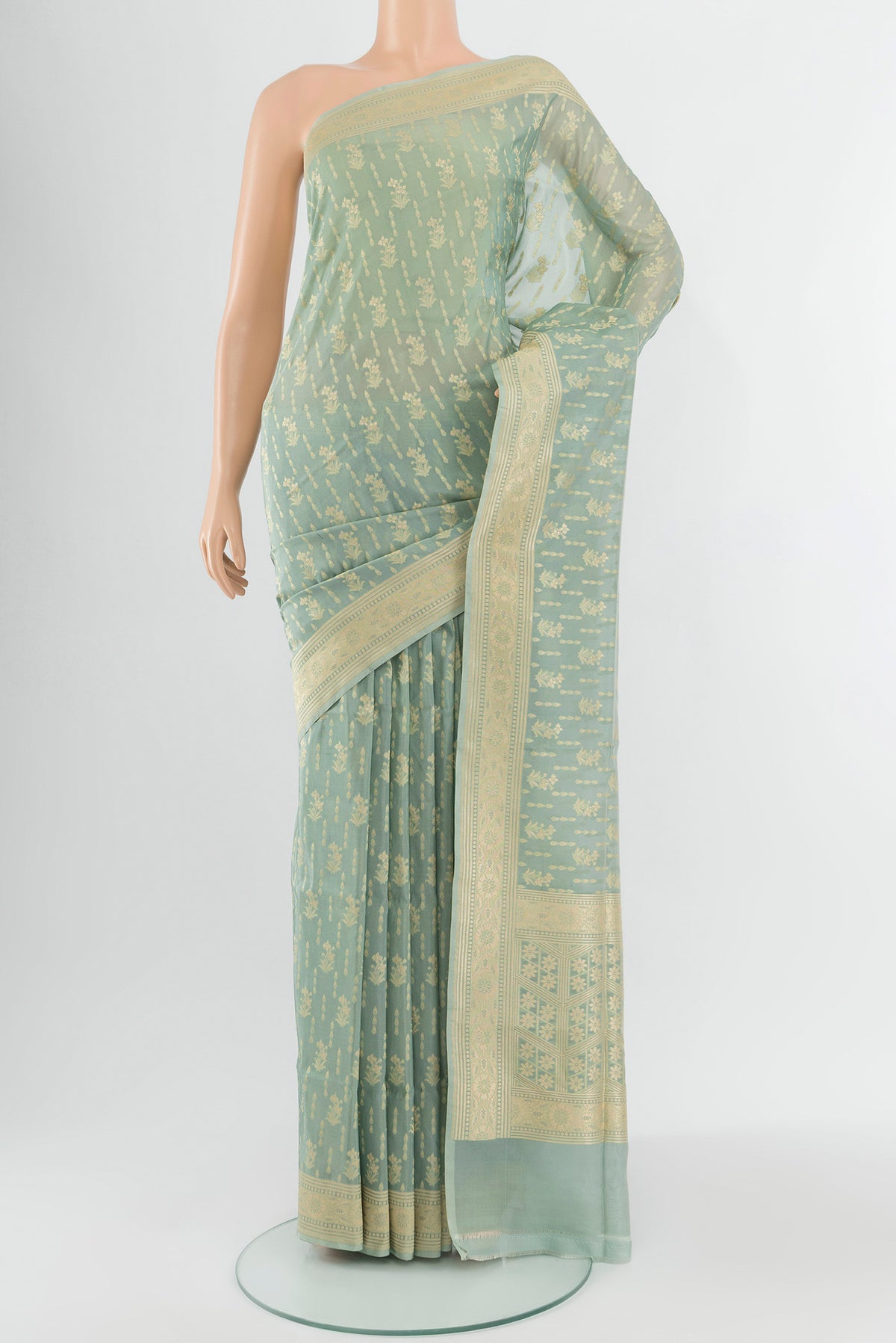 Blue Grey Banarasi Silk Saree with Zari Butta on the body and Zari Border.  displayed on a mannequin