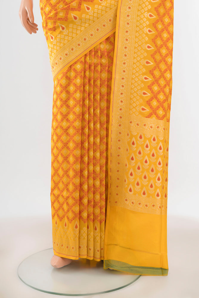 Pleats and pallu of Yellow Banarasi Silk Saree with Zari Butta on the body and Silk Border. 