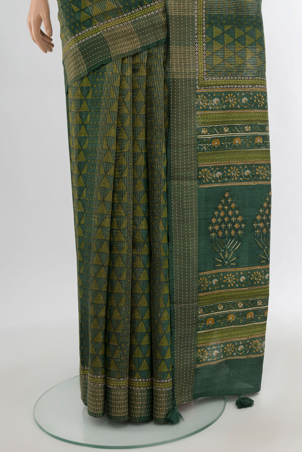 Pleats and pallu of Bottle Green Tussar Silk Saree with Floral Print on the body and Thread Border. 