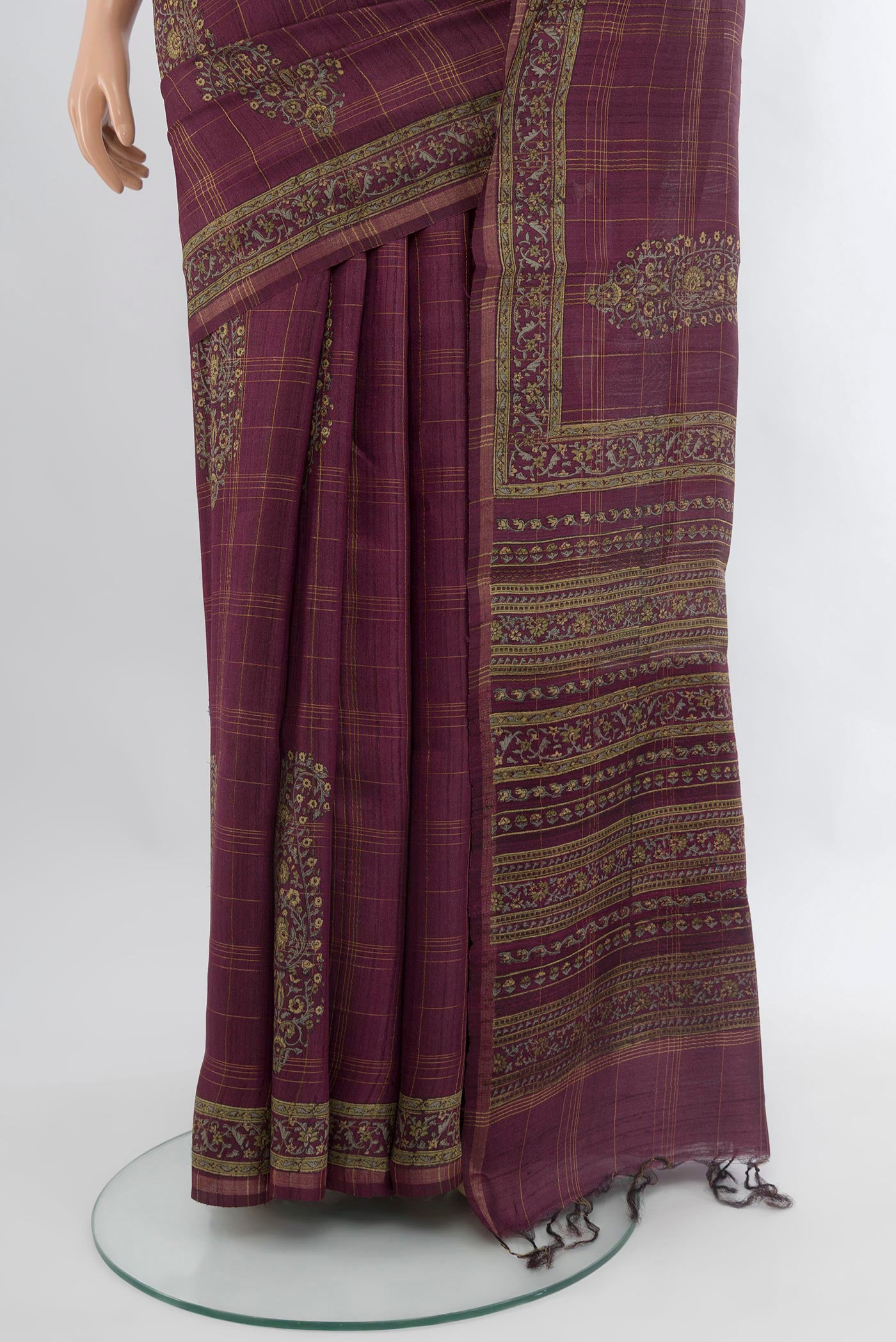Pleats and pallu of Purple Tussar Silk Saree with Floral Print on the body and Printed Border. 