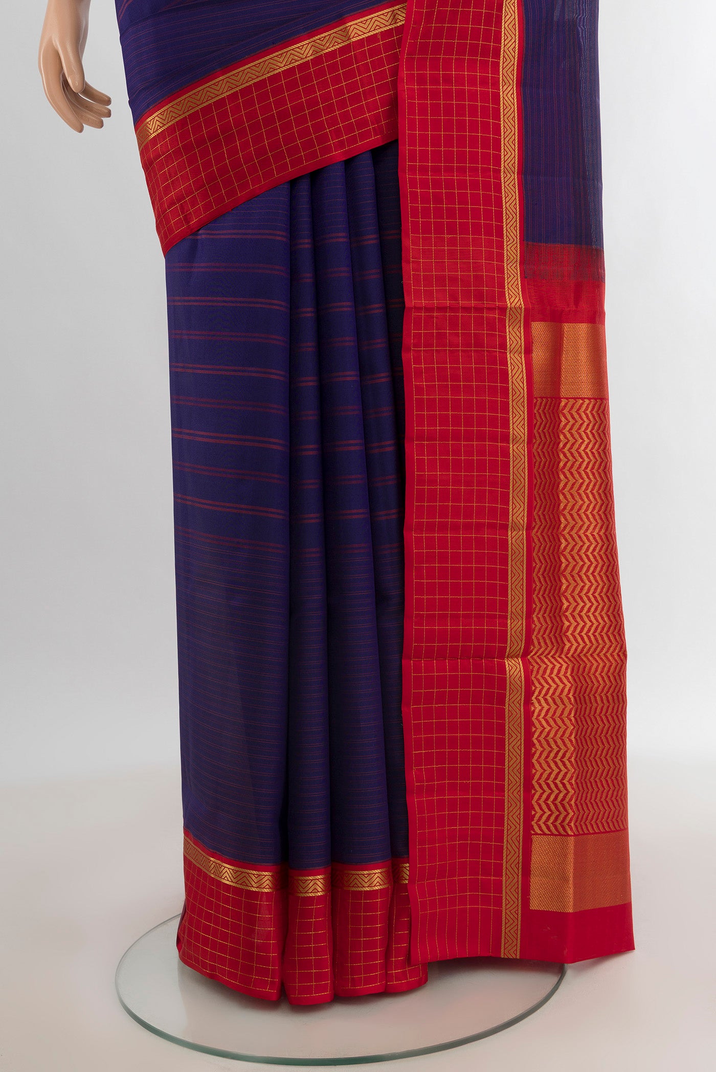 Pleats and pallu of Dark Blue Bangalore Silk - kadyal Saree with Stripes on the body and Ganga Jamuna Border. 