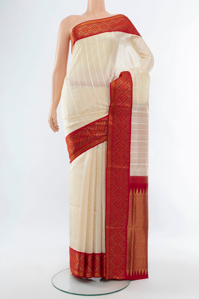Cream Bangalore Silk - kadyal Saree with Zari Butta on the body and Silk Border.  displayed on a mannequin
