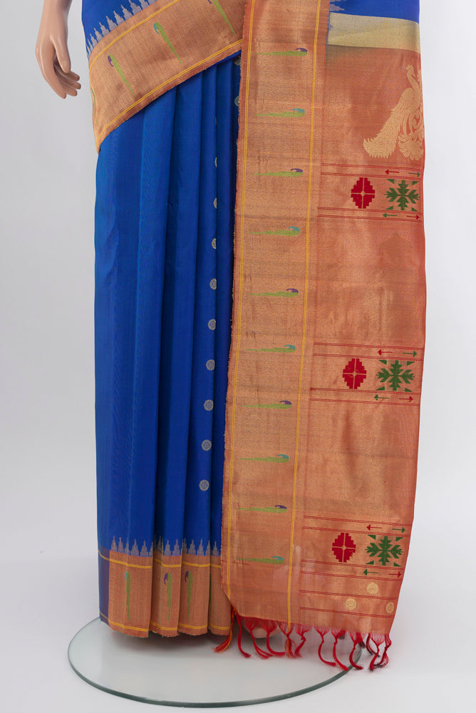 Pleats and pallu of Dark Blue Gadwal Silk Saree with Zari Butta on the body and Silk Border. 