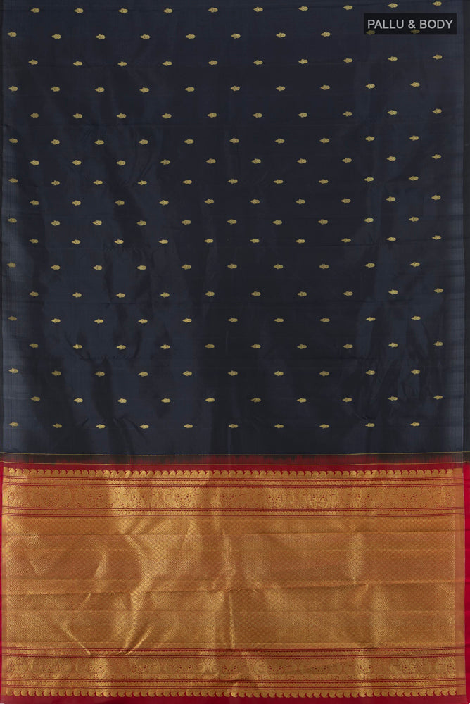 Flat view of Black Kanchipuram Silk Saree with Zari Butta on the body and Silk Border. 