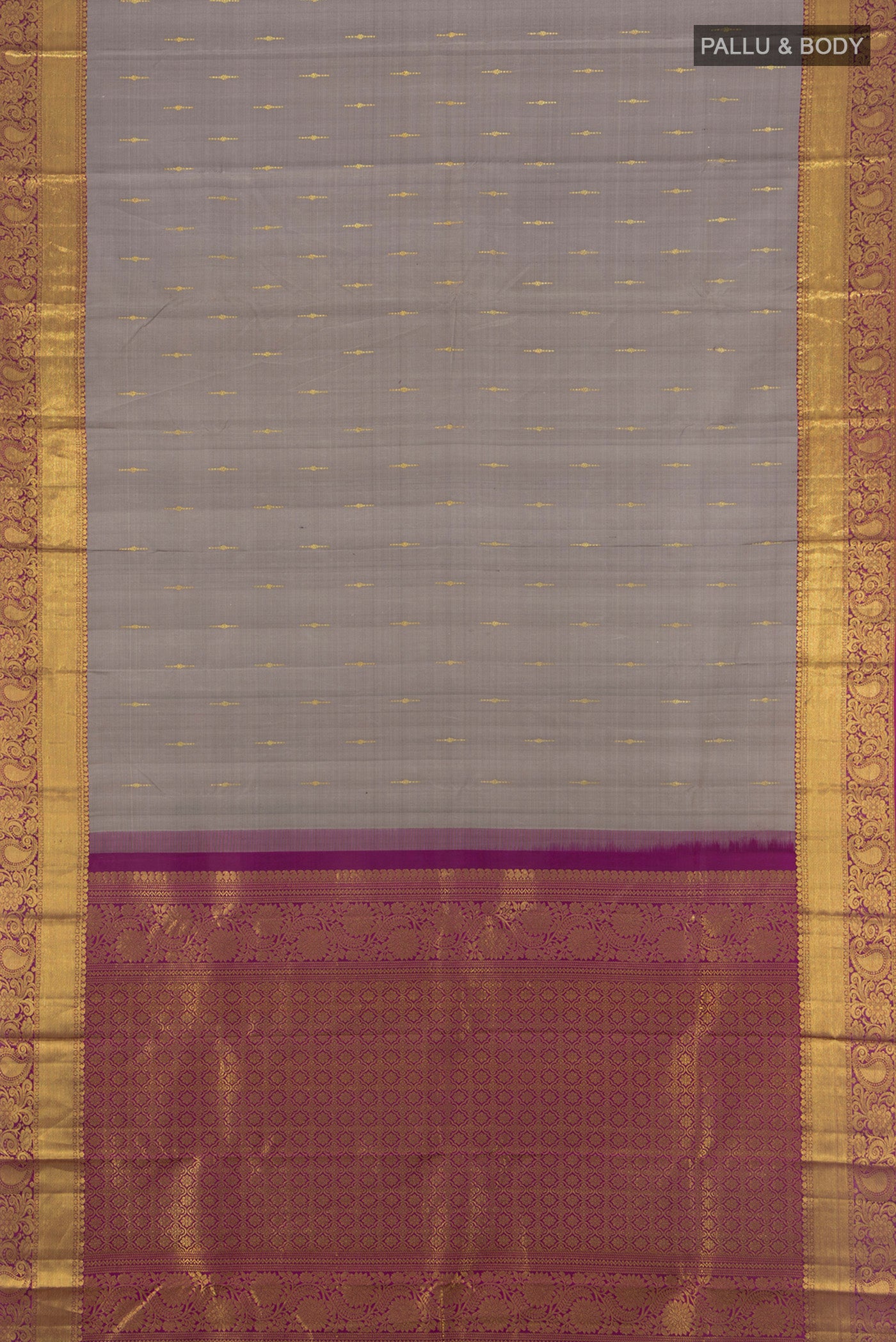Flat view of Grey Kanchipuram Silk Saree with Zari Butta on the body and Zari Border. 