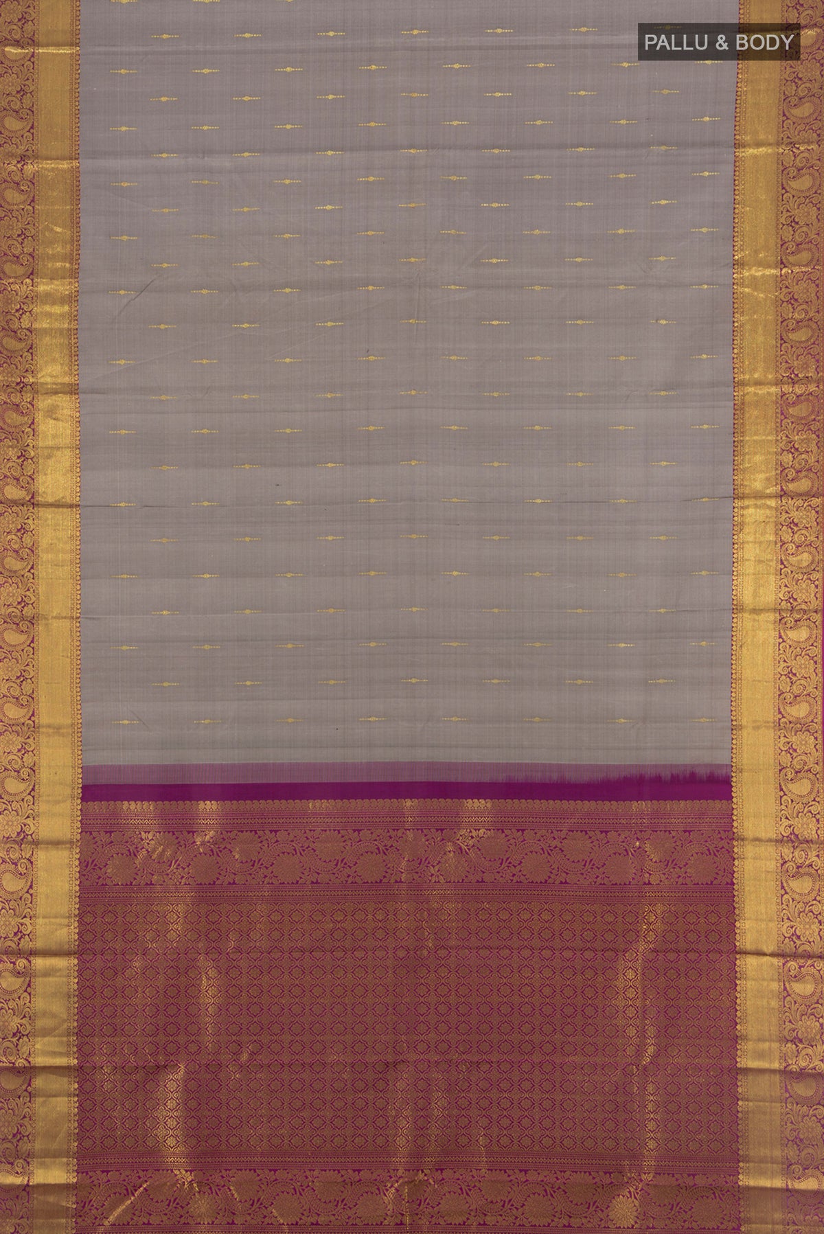 Flat view of Grey Kanchipuram Silk Saree with Zari Butta on the body and Zari Border. 